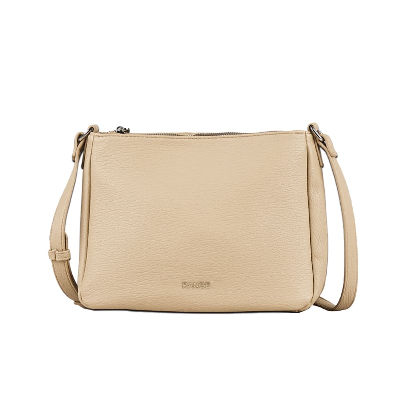 Elegant apricot synthetic leather shoulder bag with multiple compartments, available for OEM and ODM private label production.