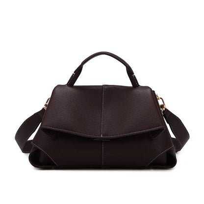 PU leather top handle handbag ebony front view metal twist lock flap bag