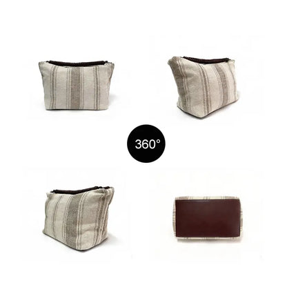Striped canvas shoulder bag internal structure with main bag and inner pockets