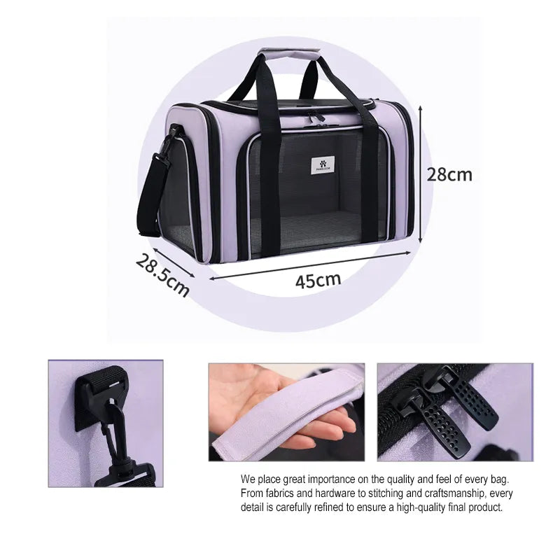 Pet carrier detail of shoulder strap hook, padded grip and dual zipper pulls