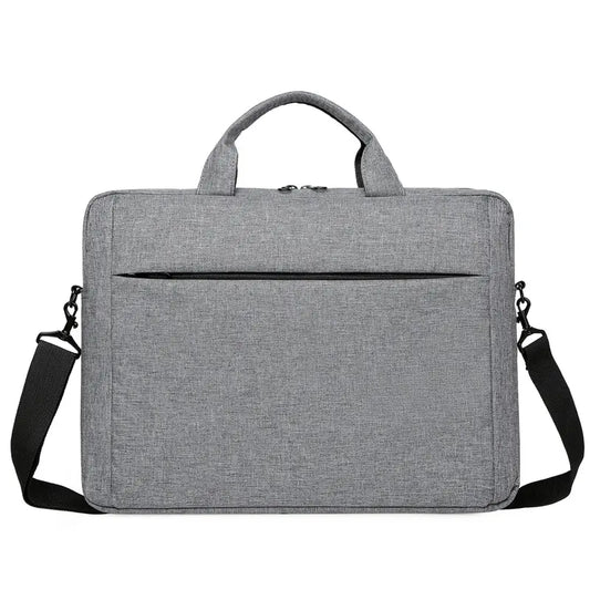 Gray briefcase angle view showing slim profile and Oxford fabric texture