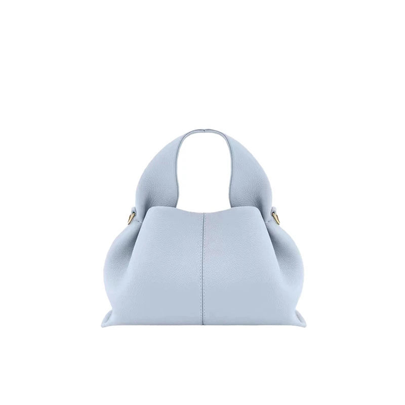 Cream white shoulder bag small size showing magnetic closure