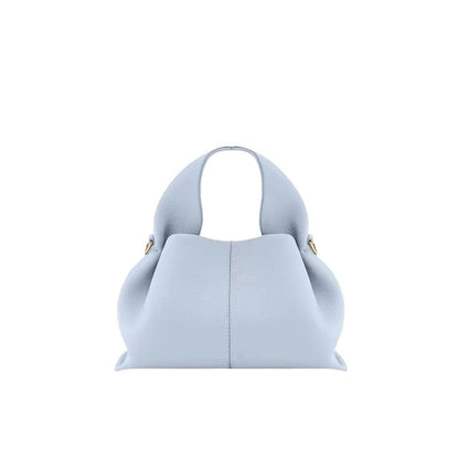 Cream white shoulder bag small size showing magnetic closure