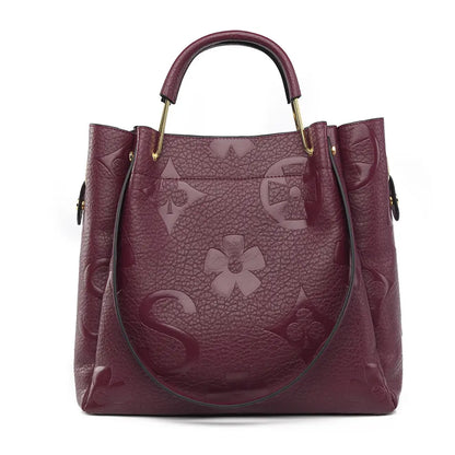 Floral embossed tote bag wine red front view floral embossed texture