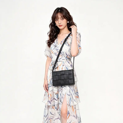 Woven PU leather crossbody bag lifestyle crossbody carry model shot