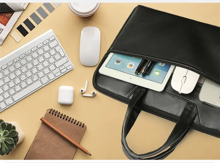 Interior view showing laptop compartment with tablet mouse phone pens organized in pockets