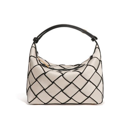 Hand-woven nylon handbag with sleek silhouette and anti-wear bottom, designed for OEM custom orders.
