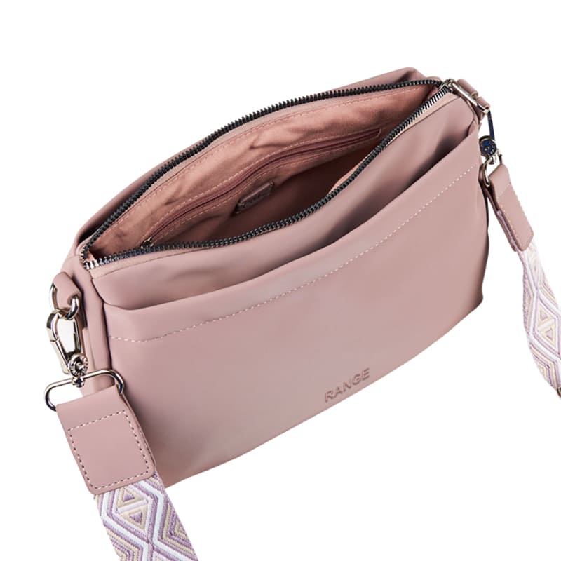 Customizable camel PU bag with multicolor removable strap, crafted for international private label partnerships.