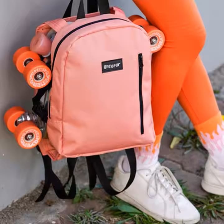 Stylish and functional oxford skate backpack with zipper and hasp closure, perfect for customized manufacturing services.