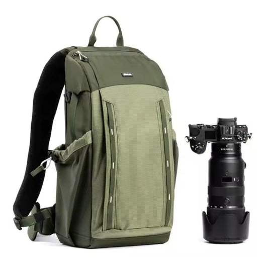 Professional photography bag with quick side access and magnetic handles, made from tarpaulin and ballistic nylon.