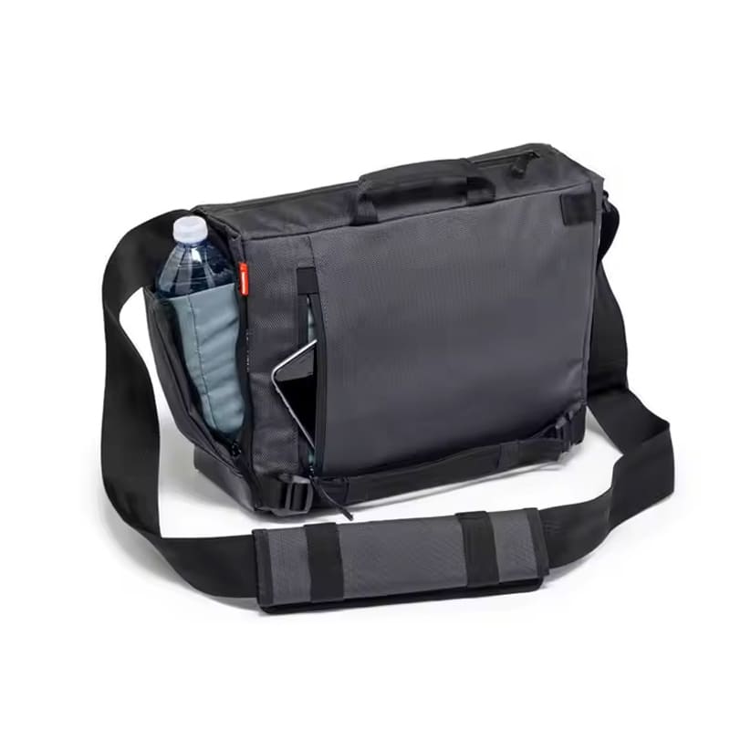 Compact 36cm camera daypack with organized interior and expandable side pocket for water bottle or tripod.