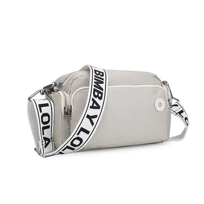 nylon crossbody bag - lifestyle shot - crossbody styling