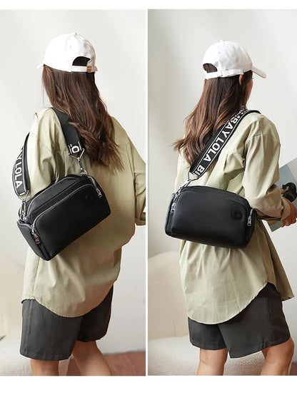 nylon crossbody bag - back view - shoulder carry