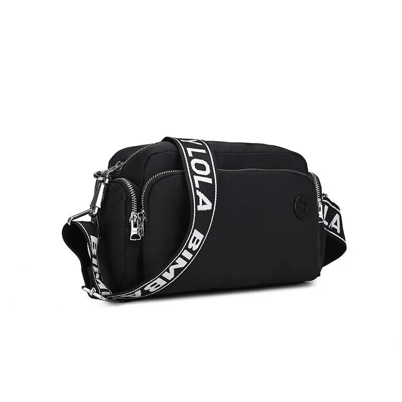 nylon crossbody bag black - front view - adjustable shoulder strap