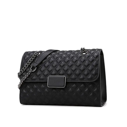 Handbag quilted texture with metal chain detail