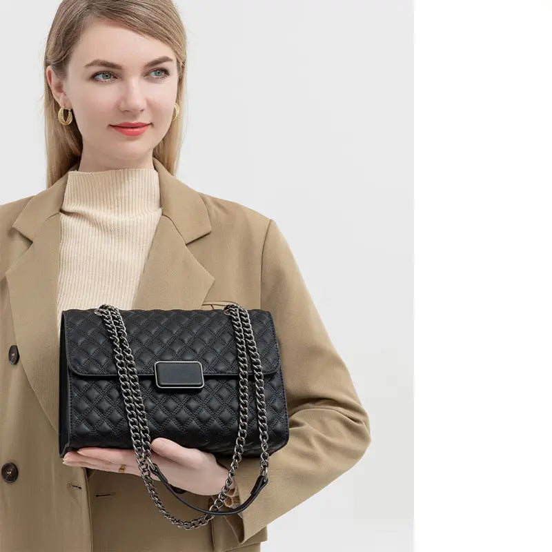 Shoulder bag worn by model for work outfit