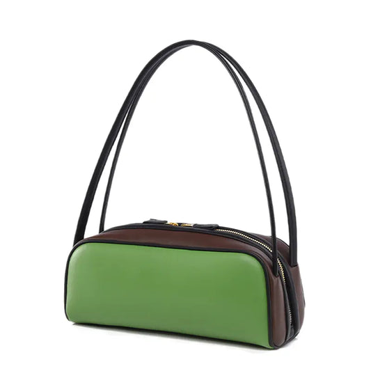 Handbag slight side view with color contrast edge