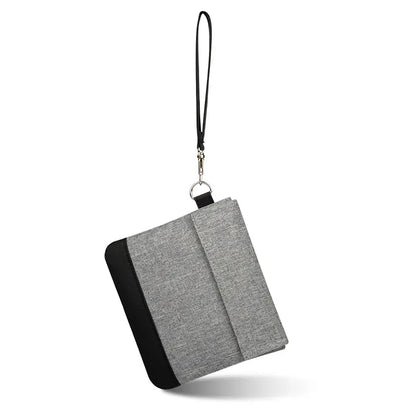 Gray carbon fiber smell proof pouch with black wrist strap and metal clasp
