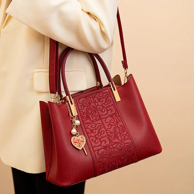 Woman in Traditional Chinese Dress Holding Red Embroidered Handbag - Wedding Lifestyle Scene