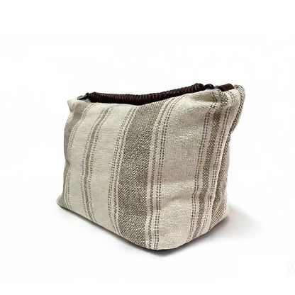 Striped canvas shoulder bag khaki gray stripe side angle soft rectangular shape