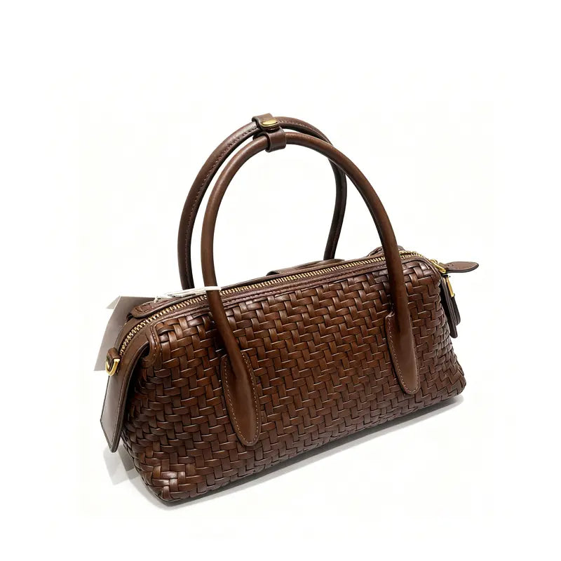 Woven handbag bottom and side stitching detail