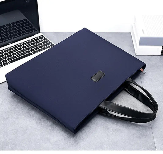 Navy blue briefcase lifestyle shot with laptop