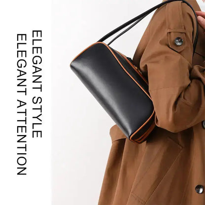 Handbag worn underarm for daily outfit