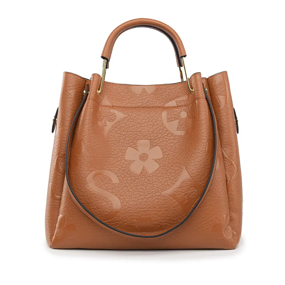 Floral embossed tote bag tan brown front view designer commuter tote